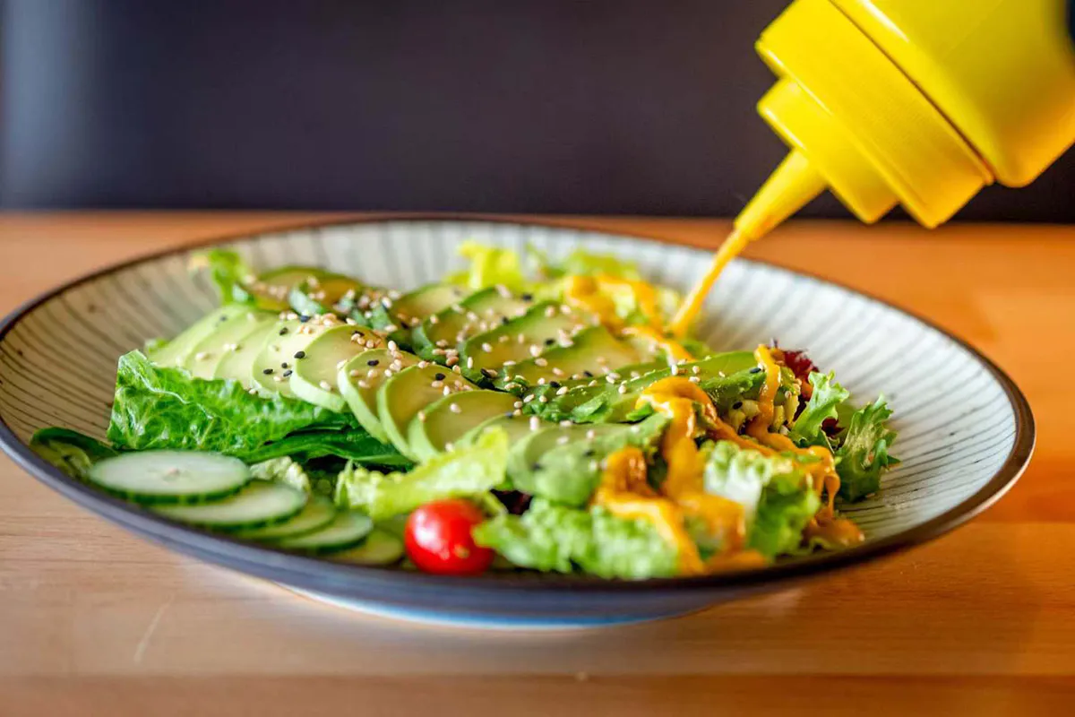 Avocado salad with cucumber lettuce and sesame at Wabi Wok & Ramen, an Asian Restaurant in Milford