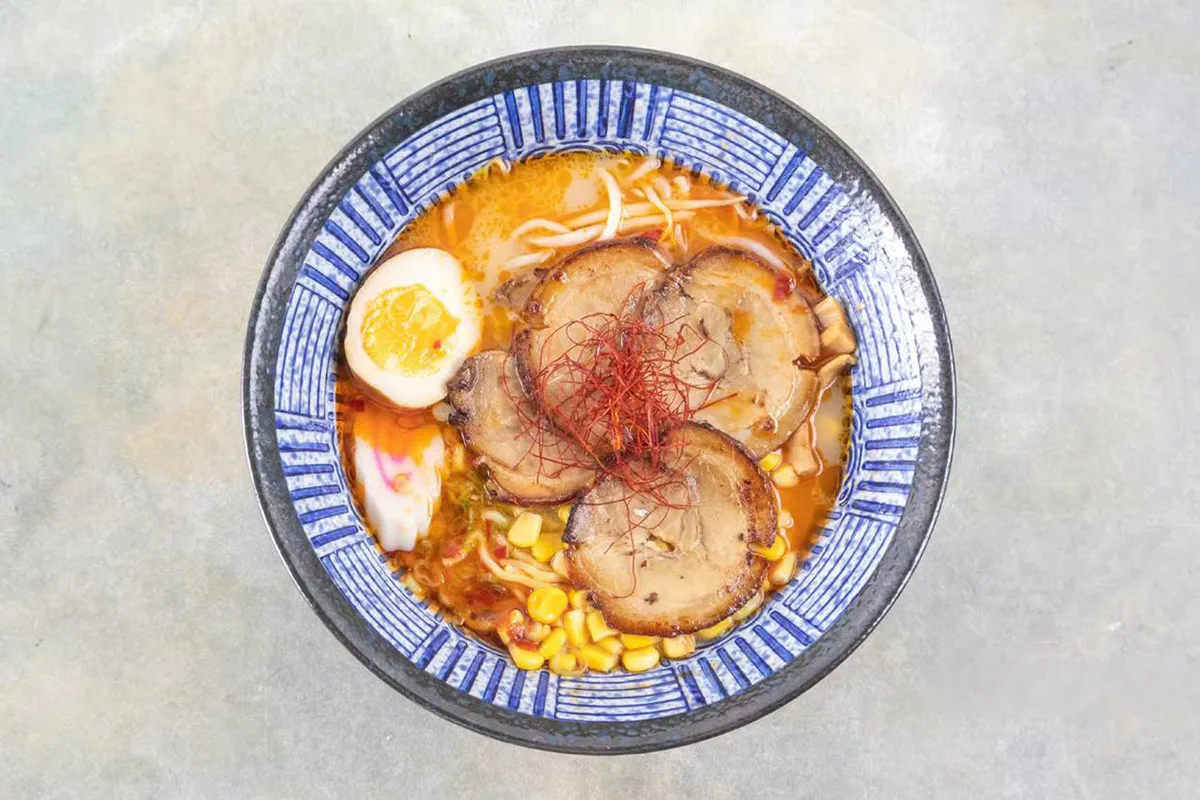 Spicy ramen with pork egg corn and fish cake at Wabi Wok & Ramen, an Asian Restaurant in Milford