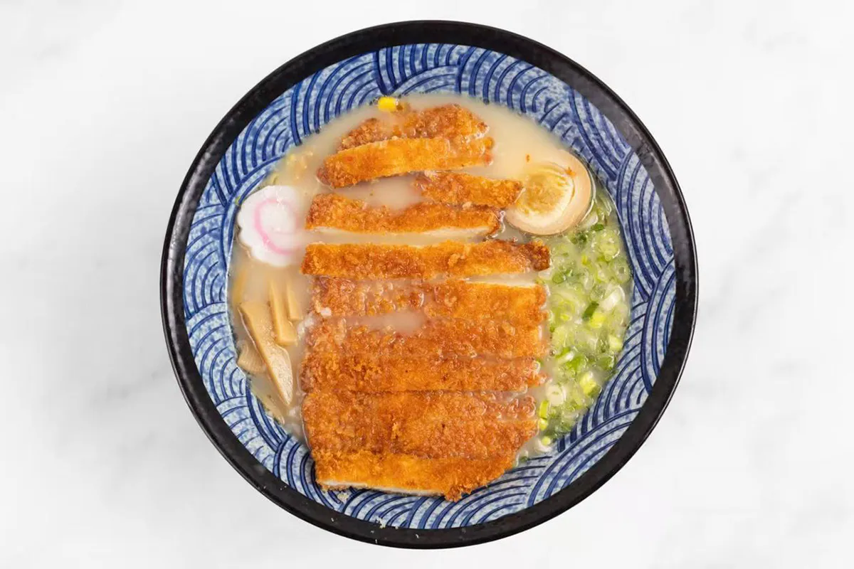 Chicken katsu ramen with egg scallions and fish cake at Wabi Wok & Ramen, an Asian Restaurant in Milford